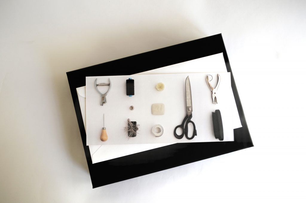 Birdseyeview of Dara Ford gift voucher depicting tailoring tools