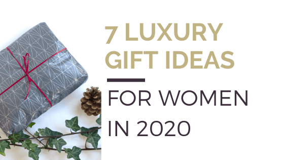 Blog title Luxury Gift Ideas for women in pictured alongside an image of a wrapped gift with pinecone and ivy