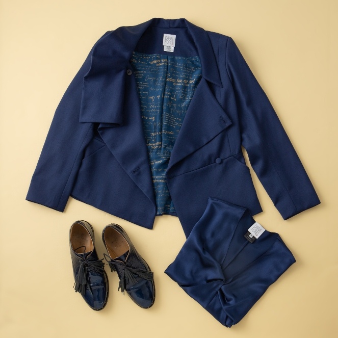 Navy jacket with silk lining blue silk camisole and brogue shoes with tassle