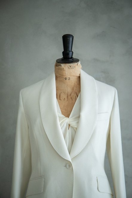 Dressmakers dummy with an ivory jacket and silk camisole top